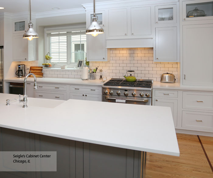 White Inset Cabinets with a Gray Kitchen Island